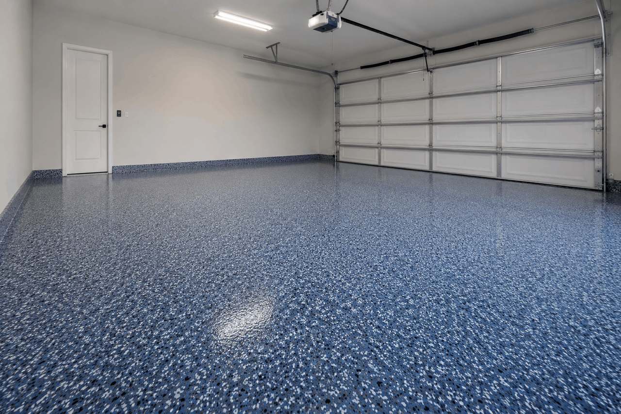 Two-car garage with a glossy blue flake floor coating