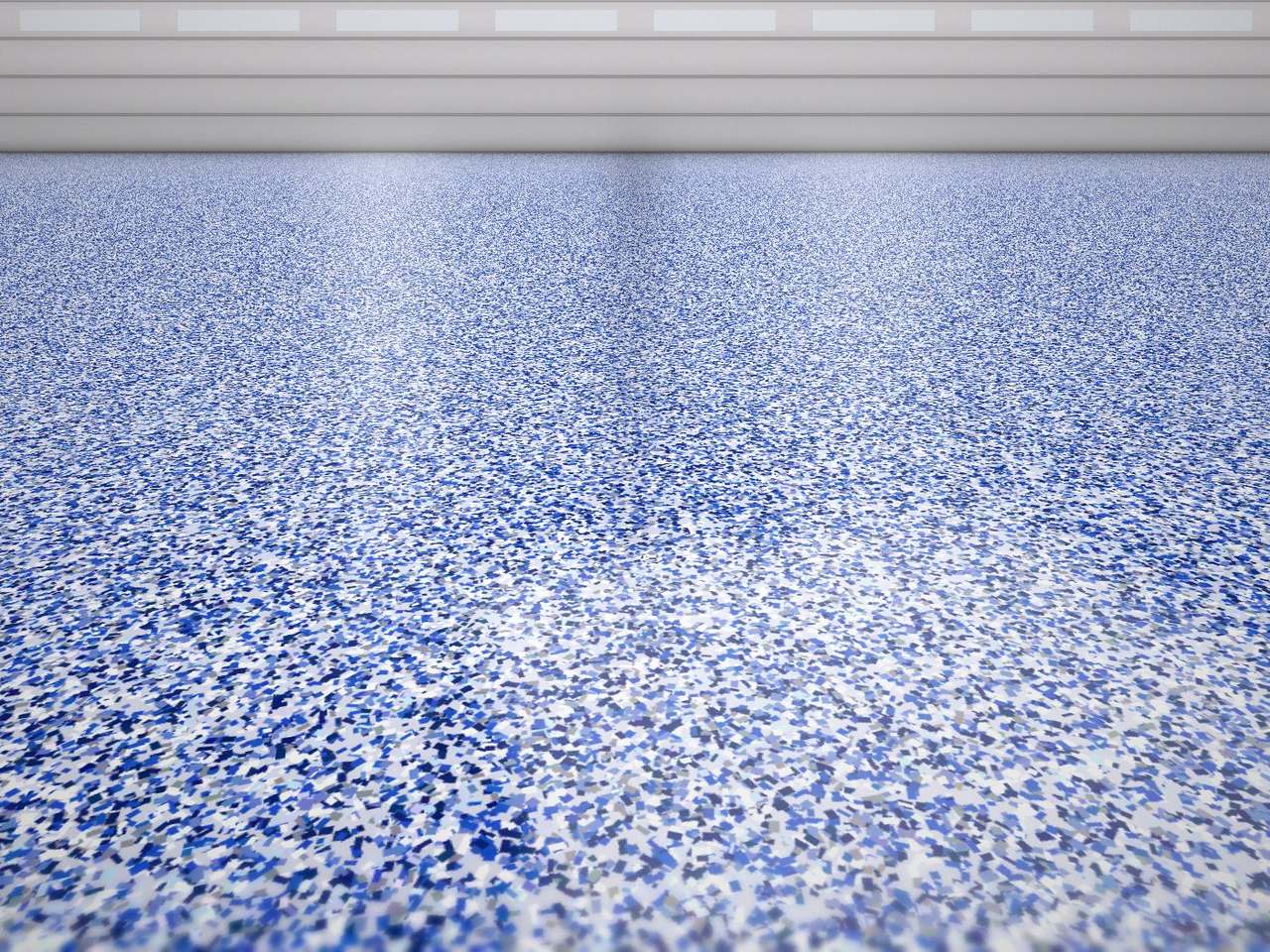 Full-broadcast flake epoxy garage floor system installed in a Fort Worth two-car garage
